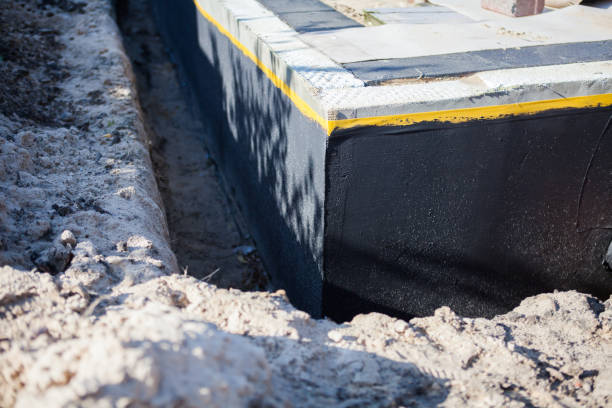 Professional Waterproofing technician working in Ashville, AL